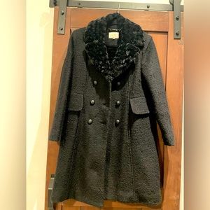 Woman’s black coat